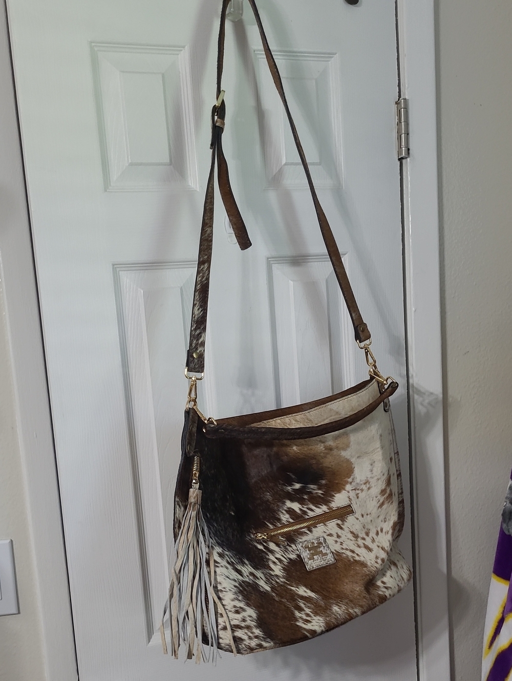 Brown and White Cowhide Leather Crossbody Bag with Tassel